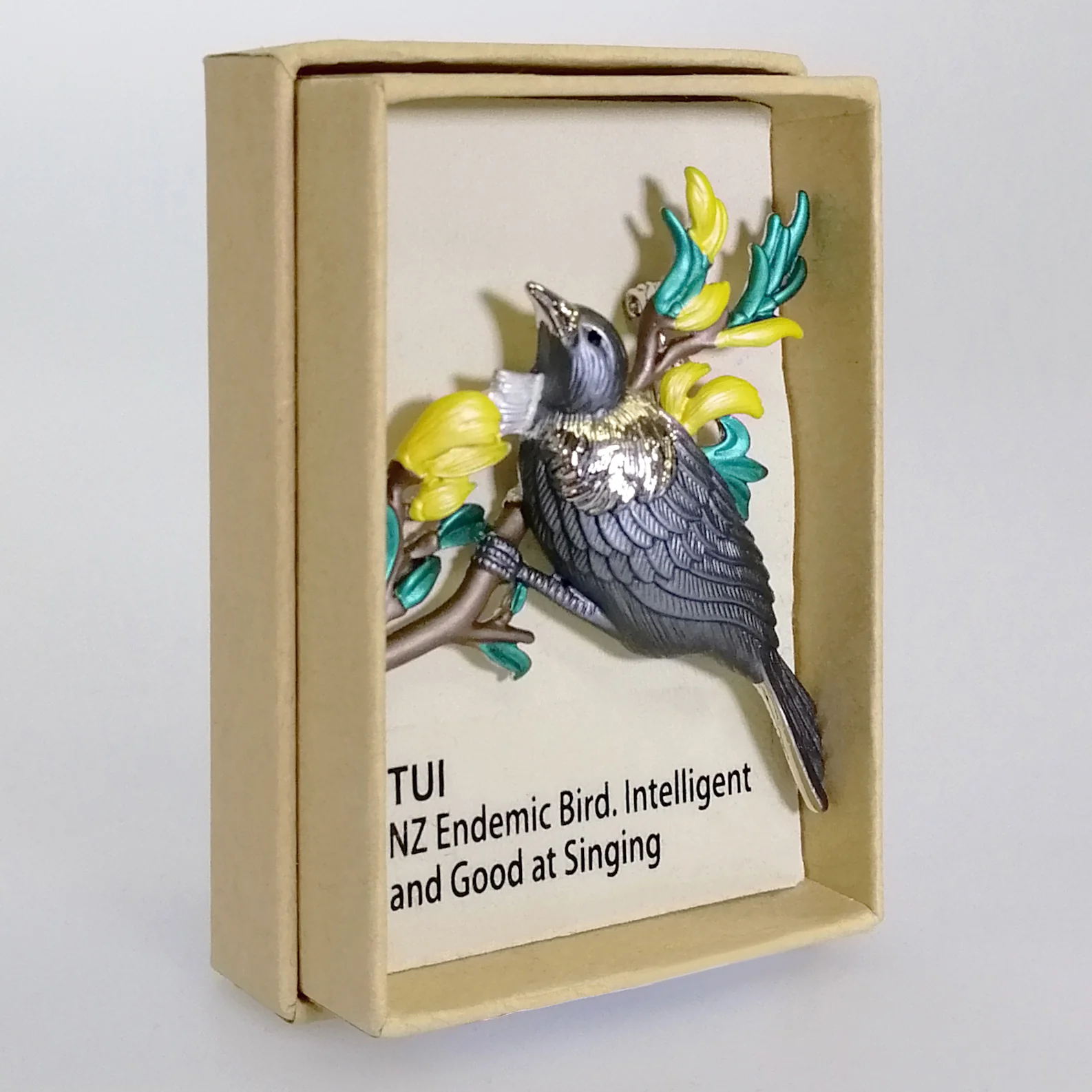 Kiwicraft - Grey Tui on Kowhai Brooch - Image 2